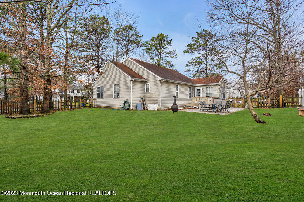 149 Marlin Road Manahawkin, NJ 08050 - Photo 36 of 36 a front view of house with a garden