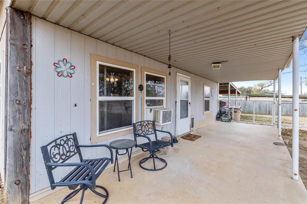 309 Goodwin Street Bangs, TX 76823 - Photo 3 of 20 a dining room with furniture and window