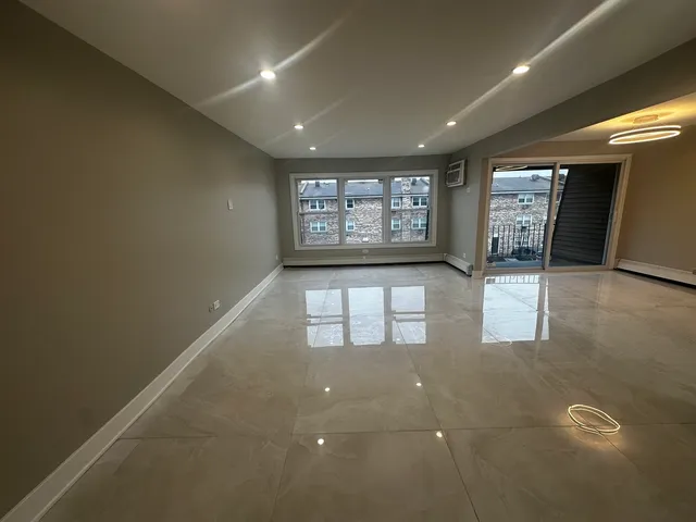 an empty room with windows