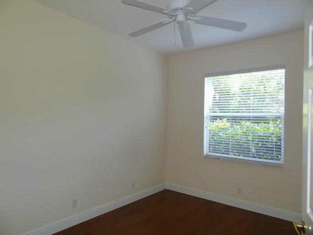 12226 Rockledge Circle Boca Raton, FL 33428 - Photo 18 of 28 3RD BEDROOM W/LAMINATE FLORS