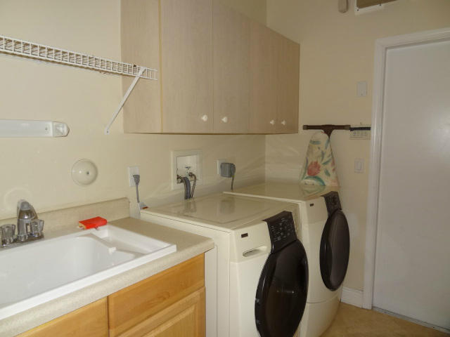 12226 Rockledge Circle Boca Raton, FL 33428 - Photo 23 of 28 SUPER LAUNDRY ROOM W/UTILITY SINK