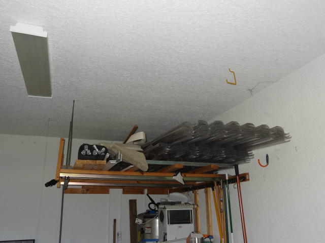 12226 Rockledge Circle Boca Raton, FL 33428 - Photo 24 of 28 HURRICANE SHUTTERS AND POOL CHILD FENCE