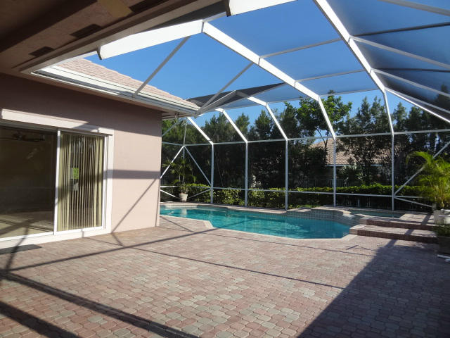 12226 Rockledge Circle Boca Raton, FL 33428 - Photo 28 of 28 FAMILY ROOM AND MASTER SLIDERS LEAD TO