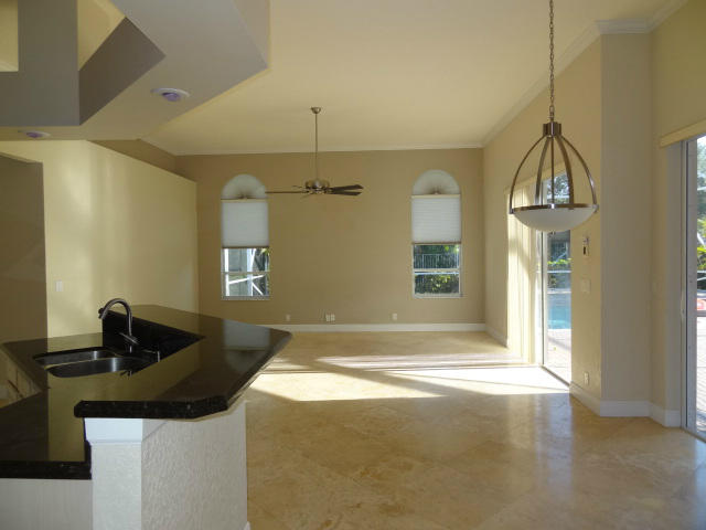 12226 Rockledge Circle Boca Raton, FL 33428 - Photo 6 of 28 ENTRY INTO KITCHEN/DINING AREA/FAM RM