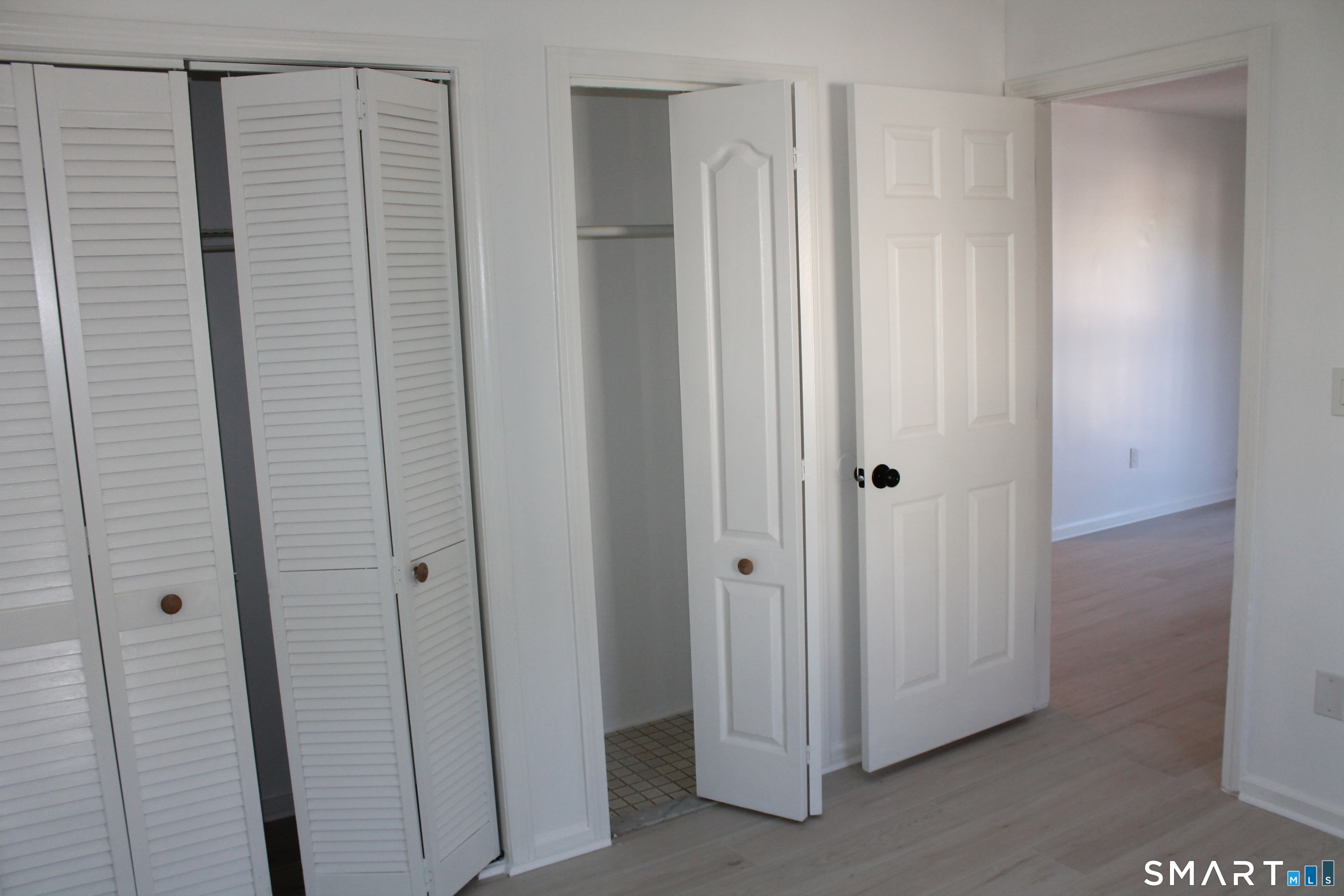 666 Broad Street, Unit 3 Meriden, CT 06450 - Photo 13 of 19 bedroom with double closet area