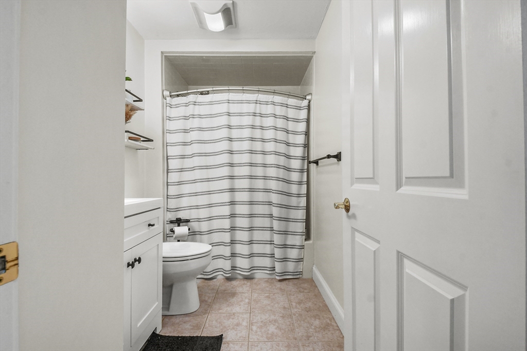 29 Maple Street, Unit C Canton, MA 02021 - Photo 15 of 27 a bathroom with a toilet and a shower