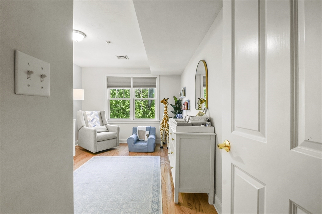 29 Maple Street, Unit C Canton, MA 02021 - Photo 17 of 27 a view of living room with furniture and window