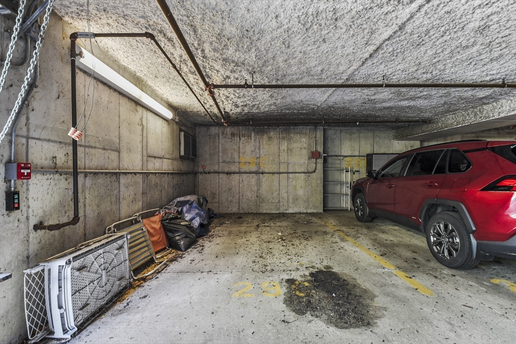 29 Maple Street, Unit C Canton, MA 02021 - Photo 26 of 27 a car parked in a garage