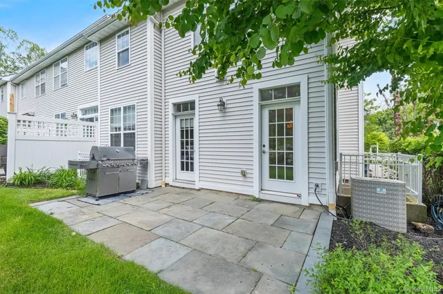a view of a house with a back yard