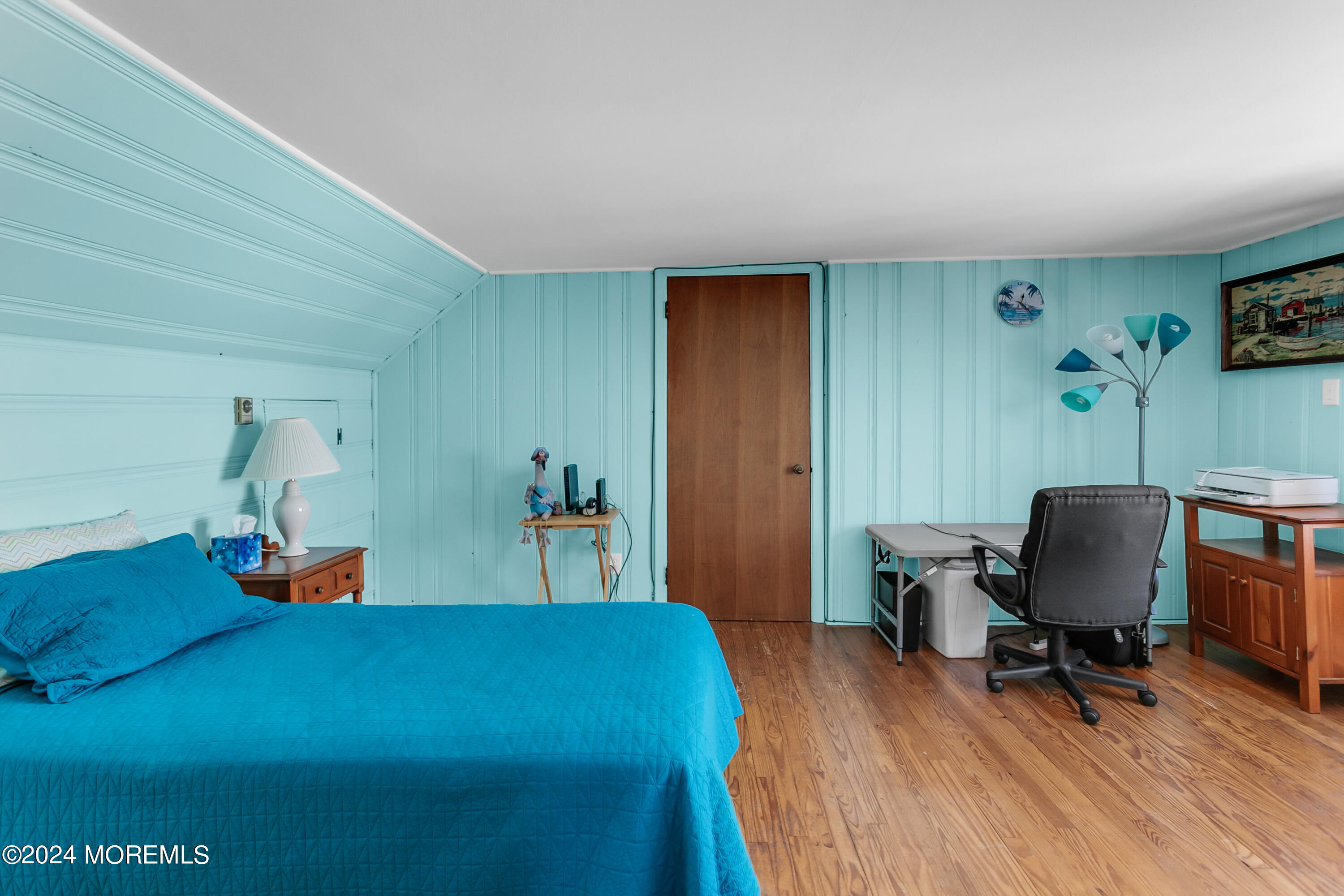 224 Ketch Road Mantoloking, NJ 08738 - Photo 31 of 43 a bed room with a bed and a chair