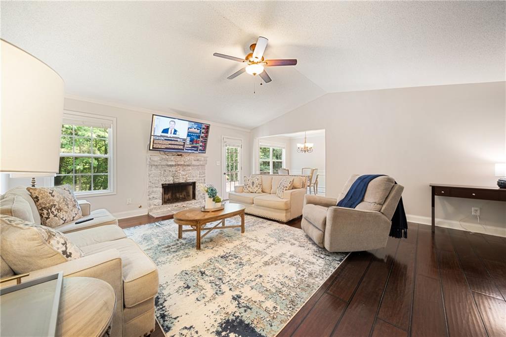 921 Pace Road Hiram, GA 30141 - Photo 7 of 41 a living room with furniture and a fireplace