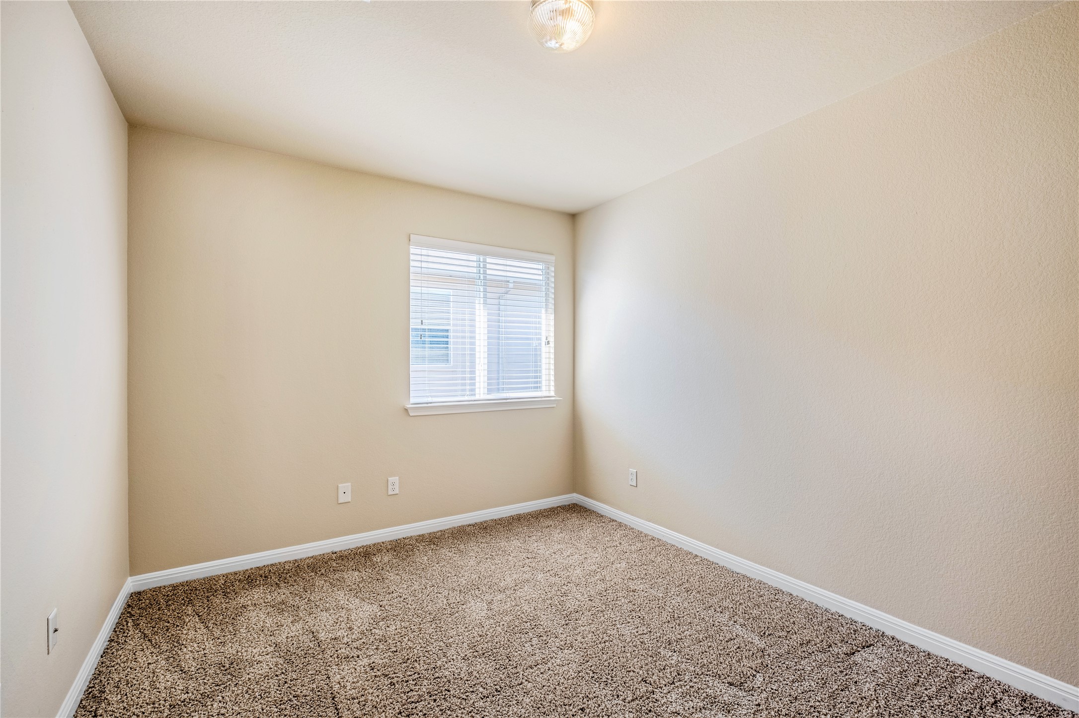 320 Comal Run Hutto, TX 78634 - Photo 18 of 21 an empty room with a window