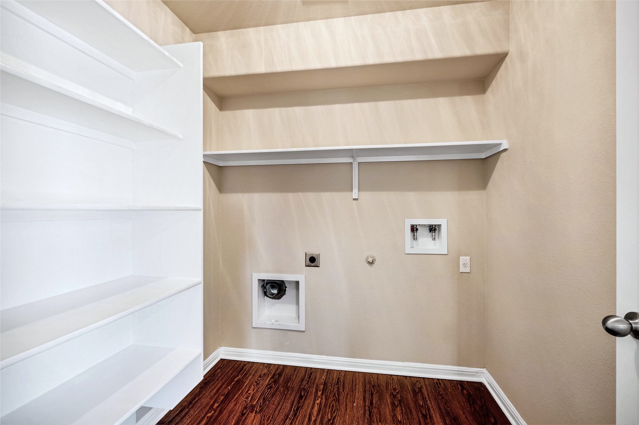 320 Comal Run Hutto, TX 78634 - Photo 19 of 21 a view of walk in closet with empty racks