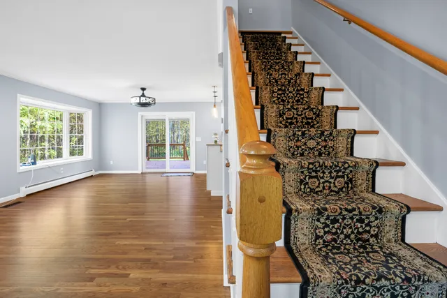 a view of entryway with wooden floor