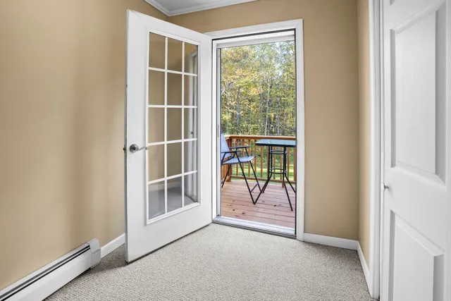 a view of workspace with furniture and a window