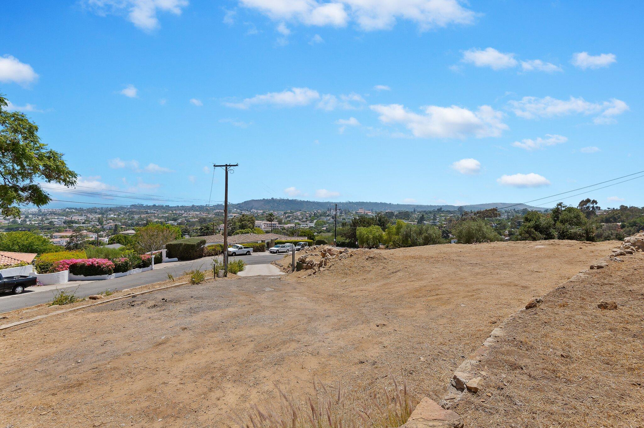 999 Garcia Road Santa Barbara, CA 93103 - Photo 8 of 16 a view of a lake with a car parked