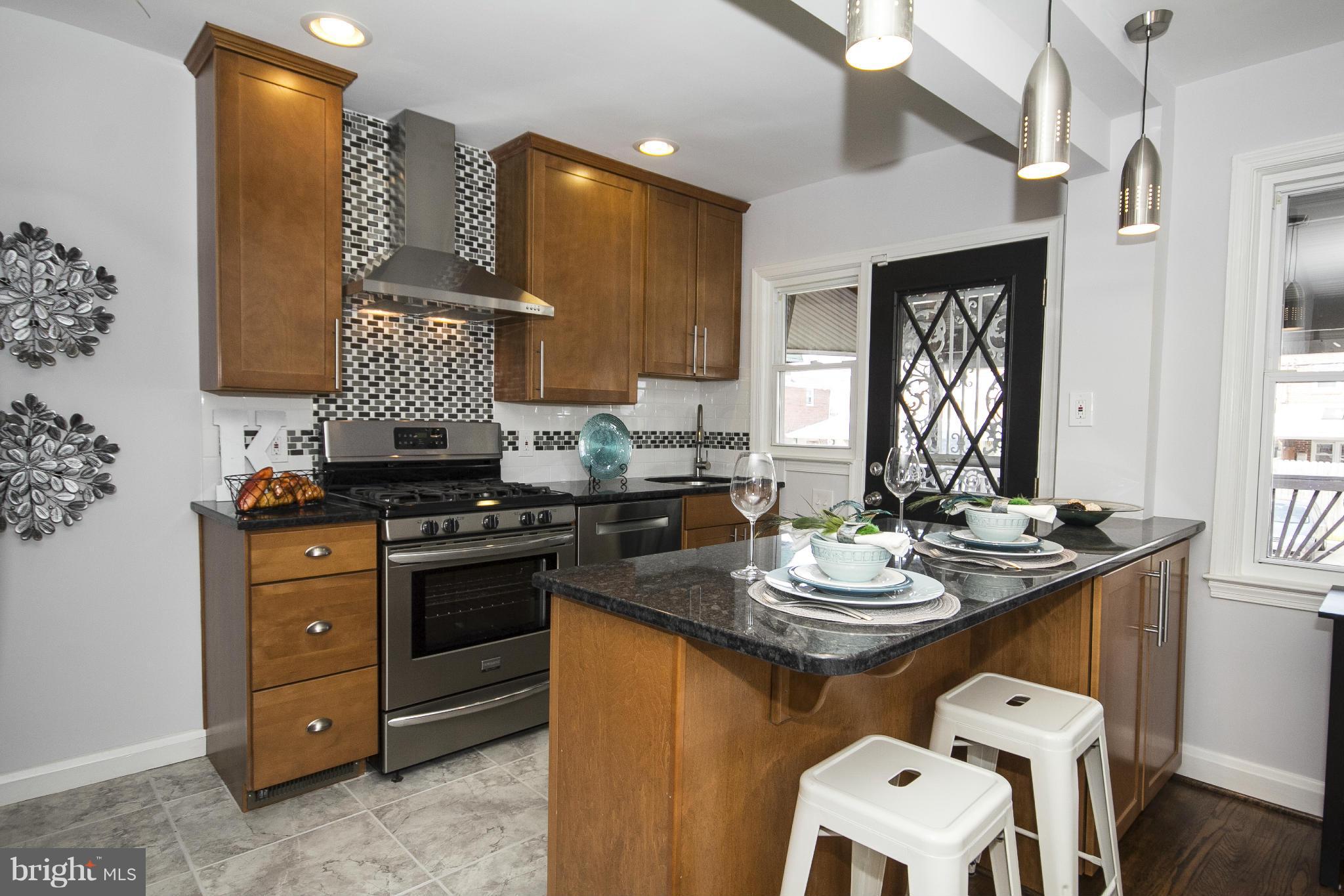 212 Kingston Road Baltimore, MD 21220 - Photo 1 of 30 Gourmet Kitchen w/ Breakfast Bar