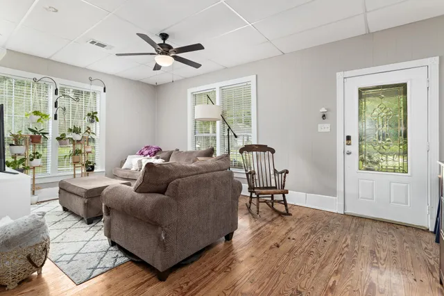 a living room with furniture and a window