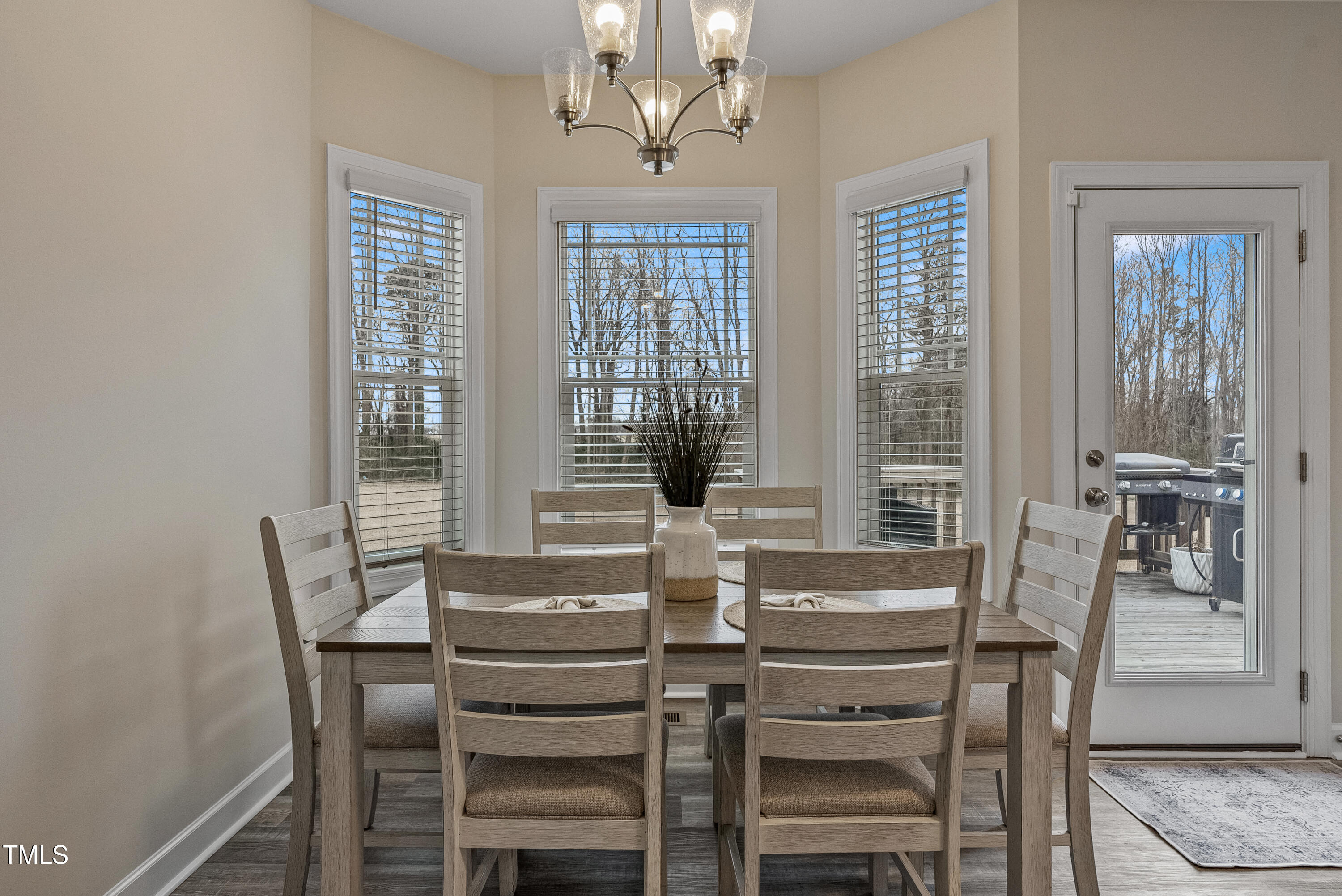 5711 Piney Grove Road Angier, NC 27501 - Photo 12 of 35 a view of a dining room with furniture window and outside view