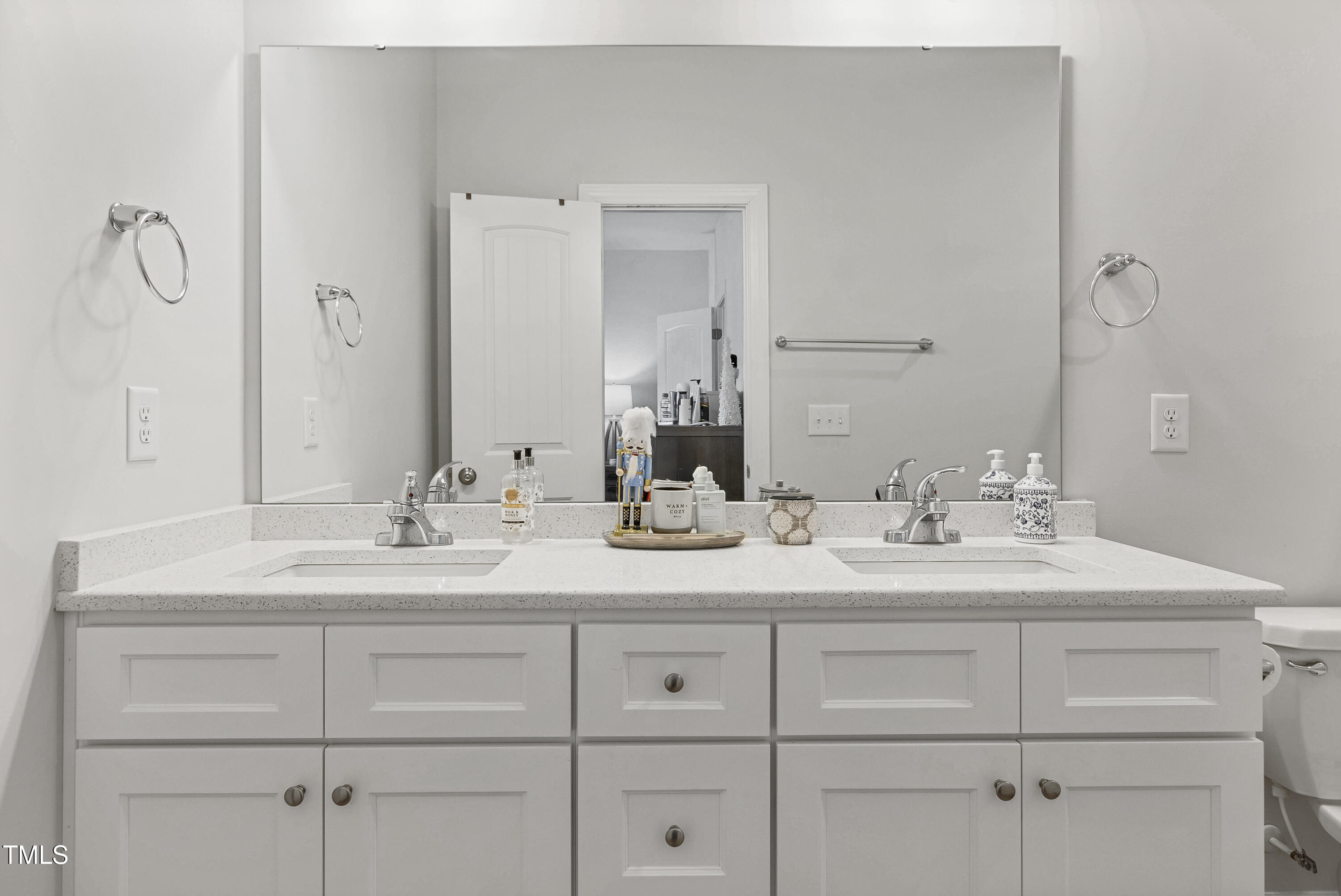 5711 Piney Grove Road Angier, NC 27501 - Photo 23 of 35 a bathroom with a sink vanity and mirror