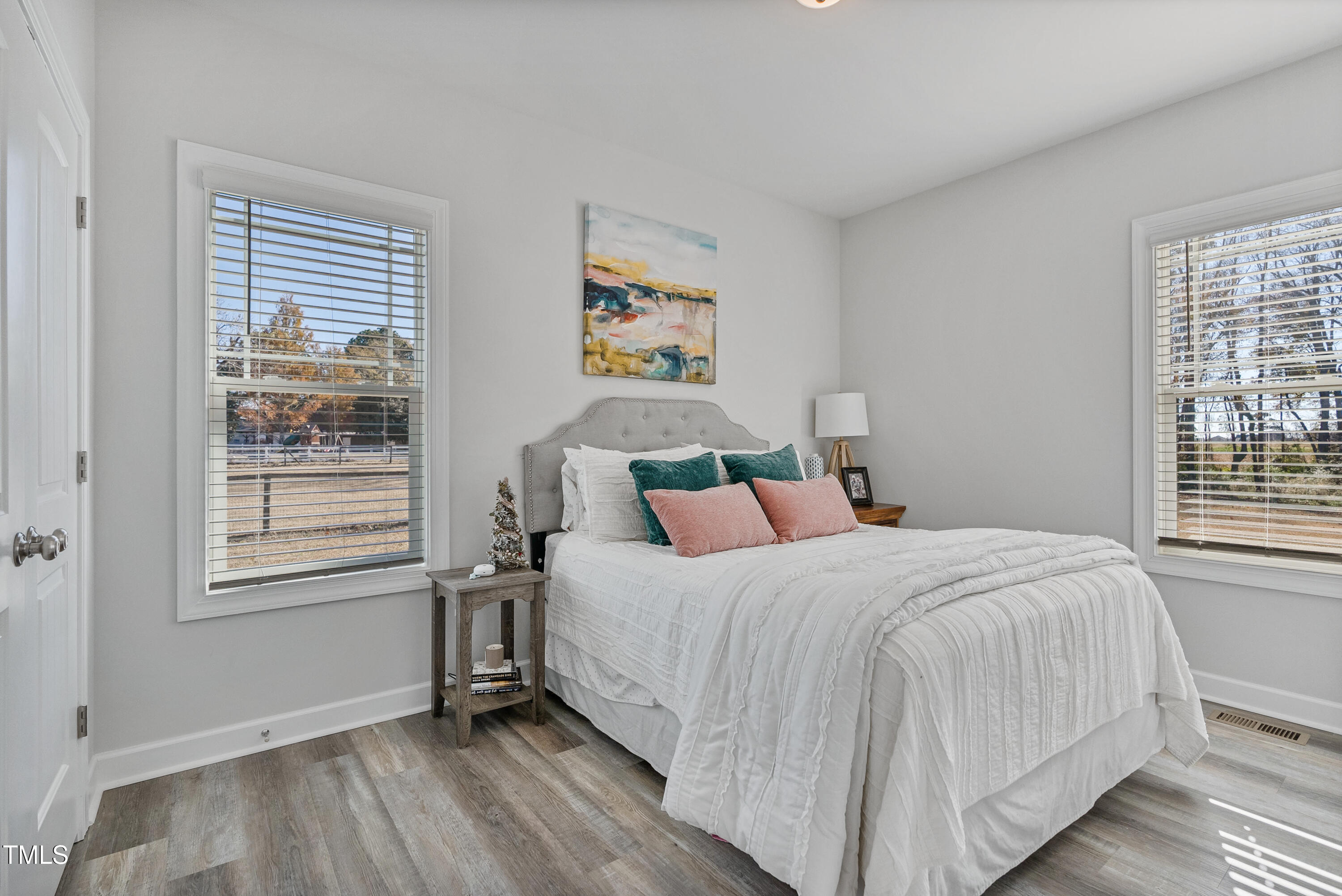 5711 Piney Grove Road Angier, NC 27501 - Photo 26 of 35 a bedroom with a bed and a window