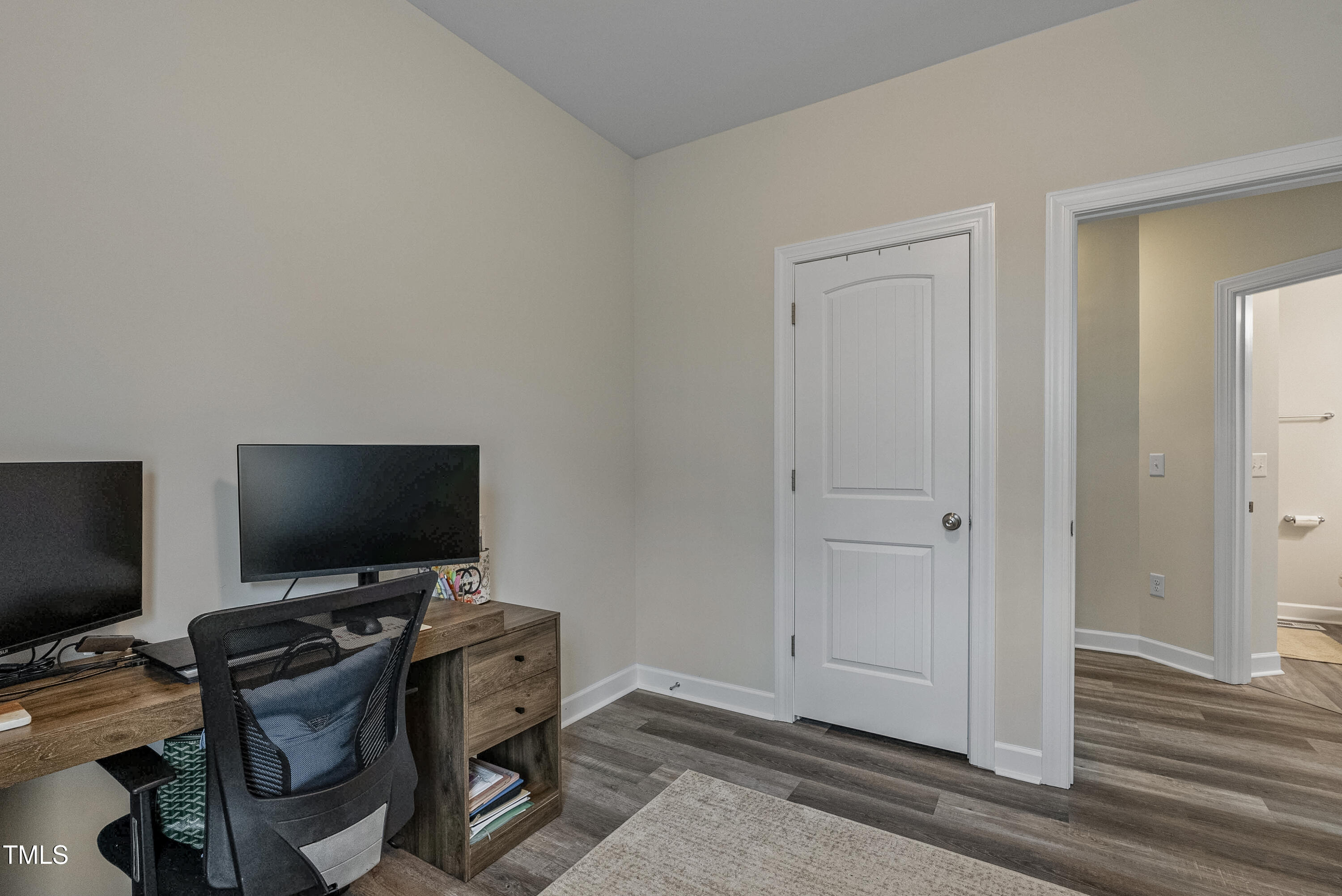 5711 Piney Grove Road Angier, NC 27501 - Photo 28 of 35 a view of a workspace with furniture and a flat screen tv