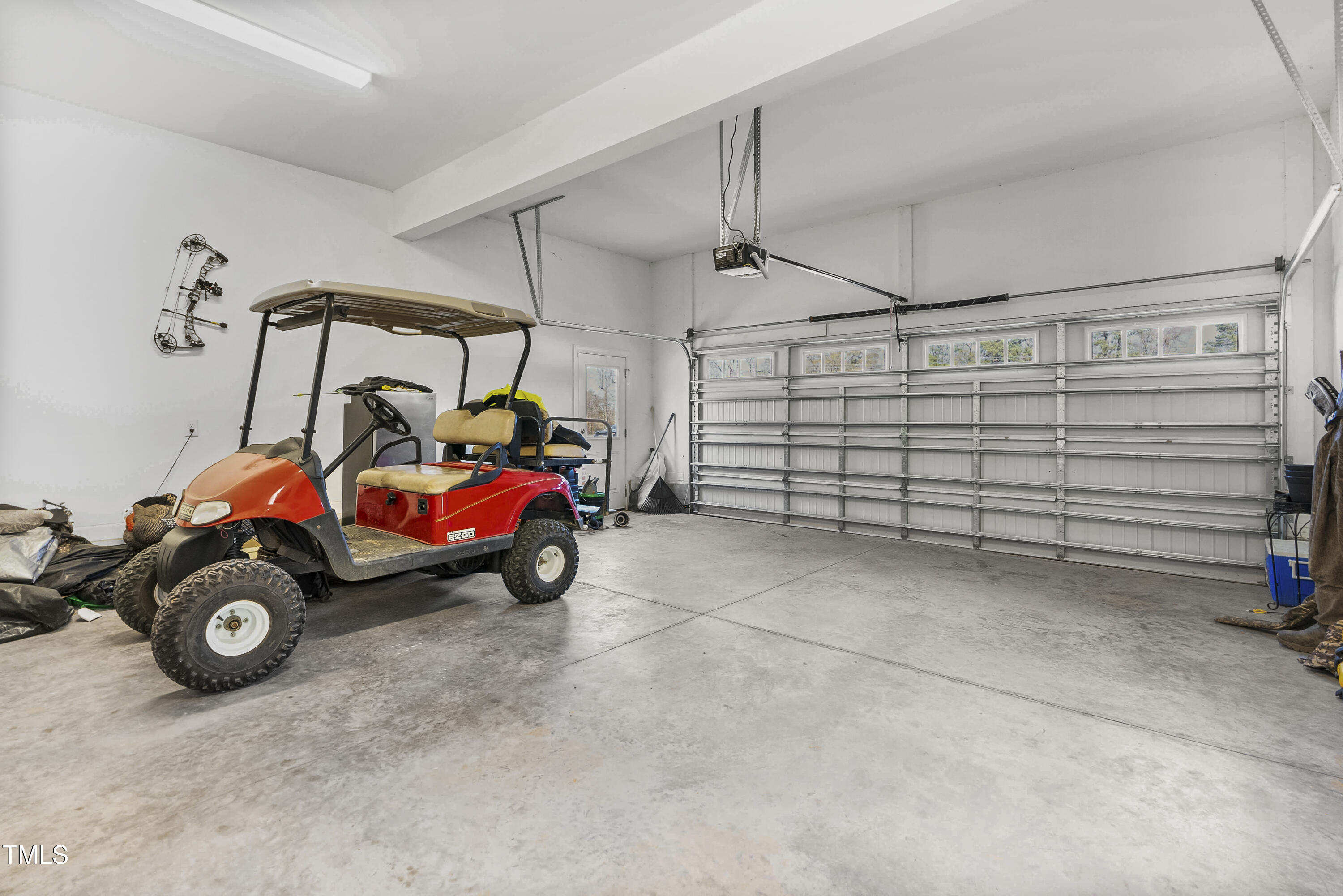 5711 Piney Grove Road Angier, NC 27501 - Photo 30 of 35 a view of a garage and car parked