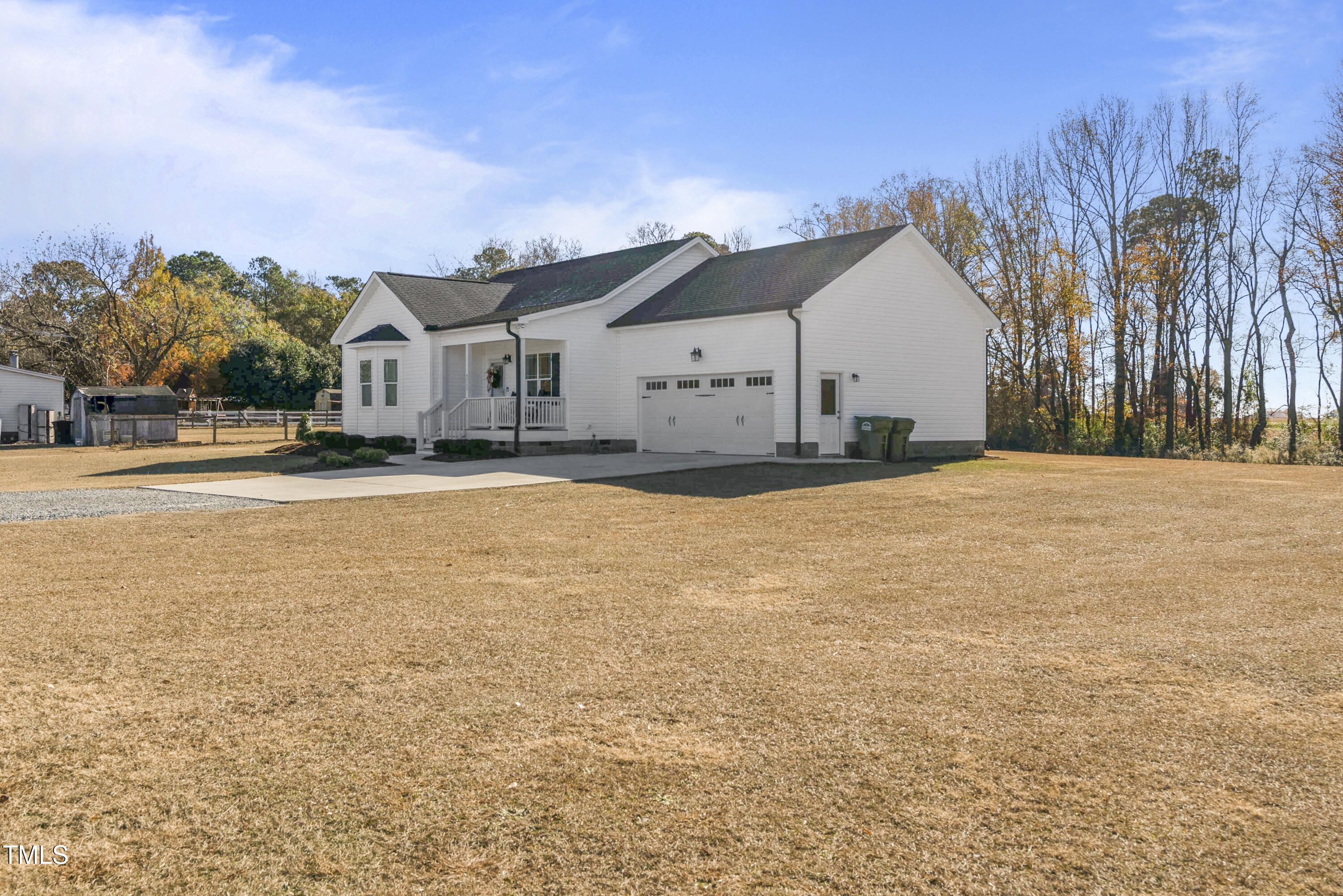5711 Piney Grove Road Angier, NC 27501 - Photo 5 of 35 a front view of a house with a yard