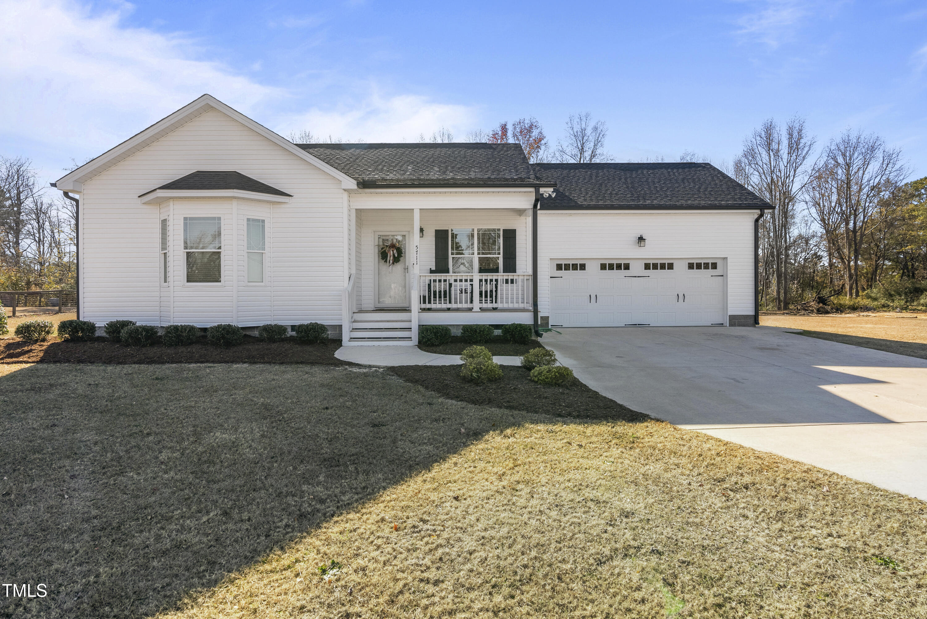 5711 Piney Grove Road Angier, NC 27501 - Photo 7 of 35 a view of a house with a yard