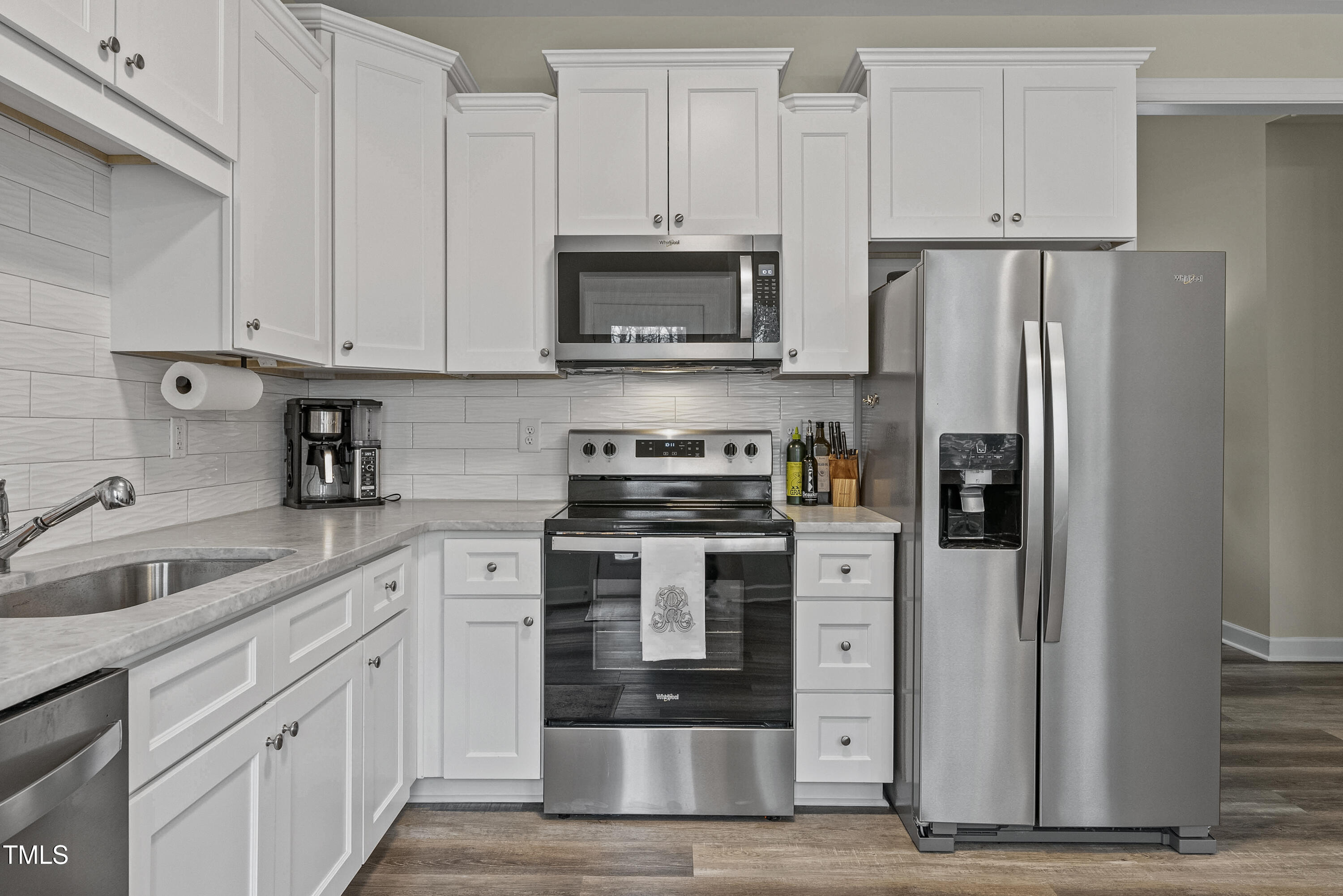 5711 Piney Grove Road Angier, NC 27501 - Photo 9 of 35 a kitchen with stainless steel appliances granite countertop a refrigerator stove and sink