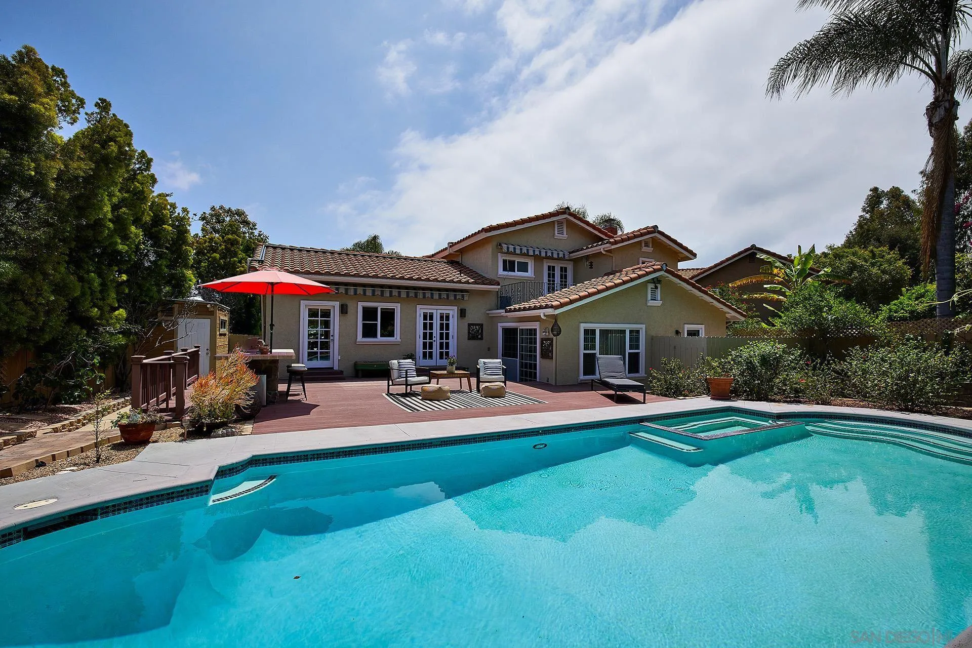 1548 Calle Violetas Encinitas, CA 92024 - Photo 12 of 47 a front view of house with yard and outdoor seating