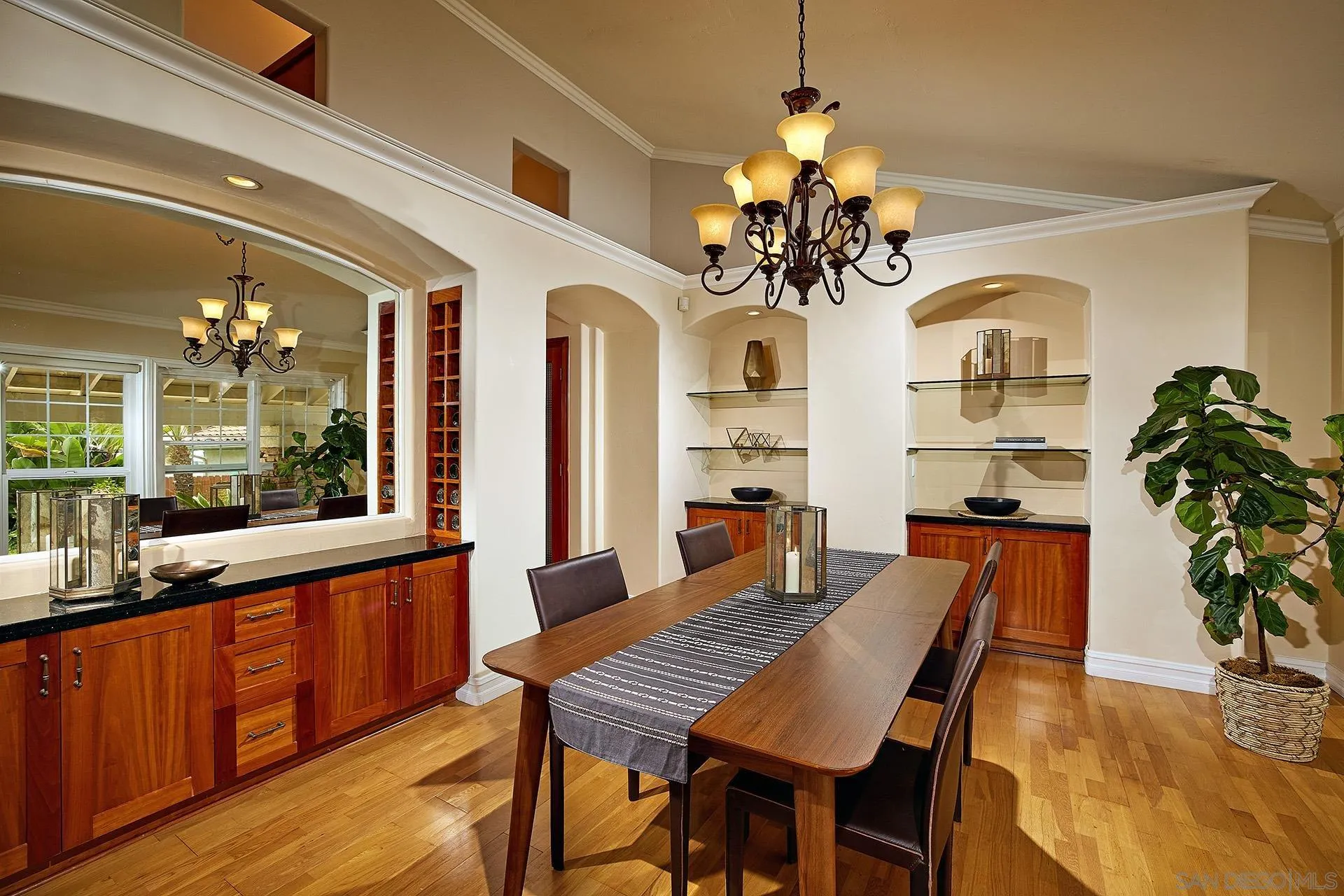 1548 Calle Violetas Encinitas, CA 92024 - Photo 16 of 47 a view of a dining room with furniture window and wooden floor