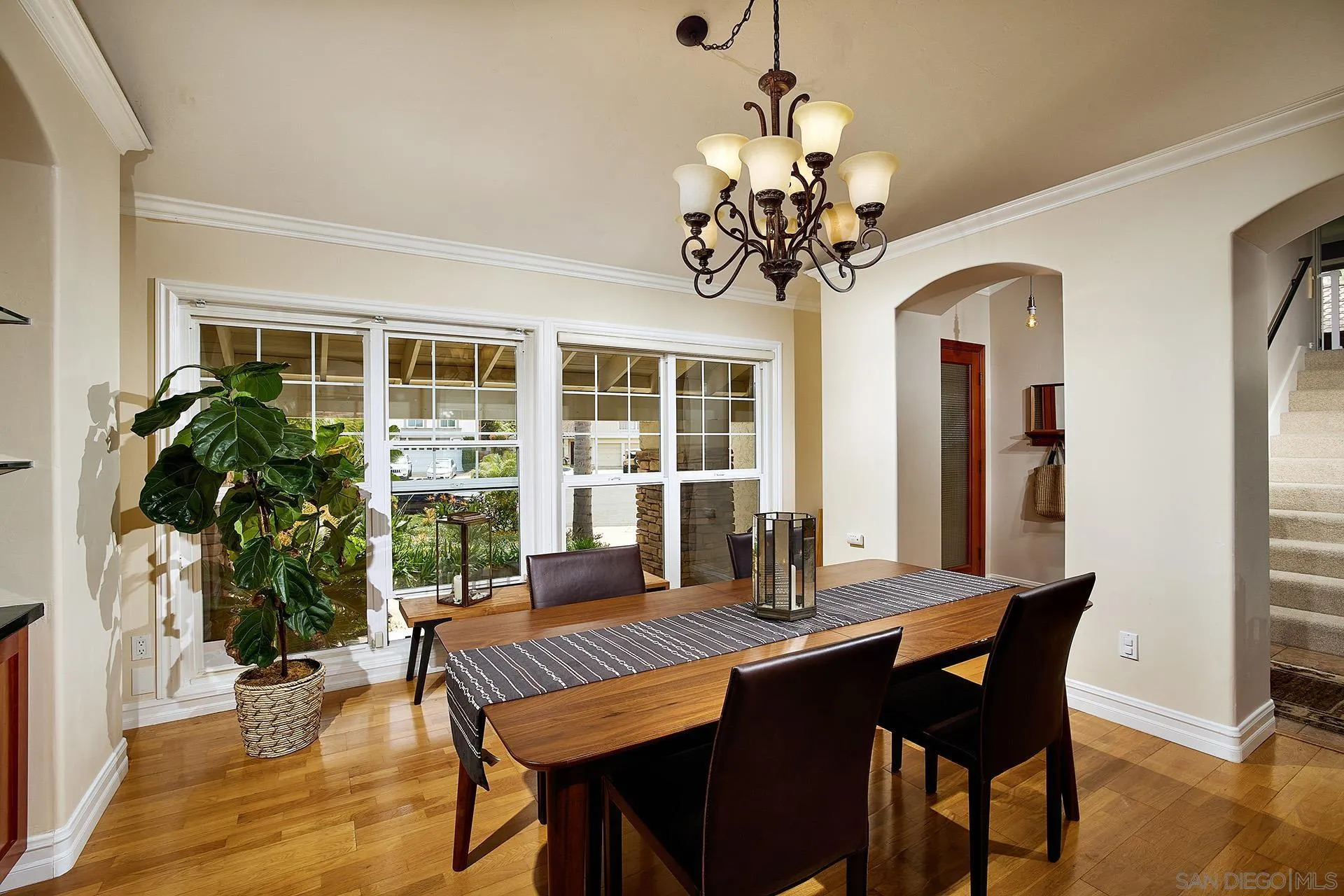 1548 Calle Violetas Encinitas, CA 92024 - Photo 17 of 47 a view of a dining room with furniture window and wooden floor
