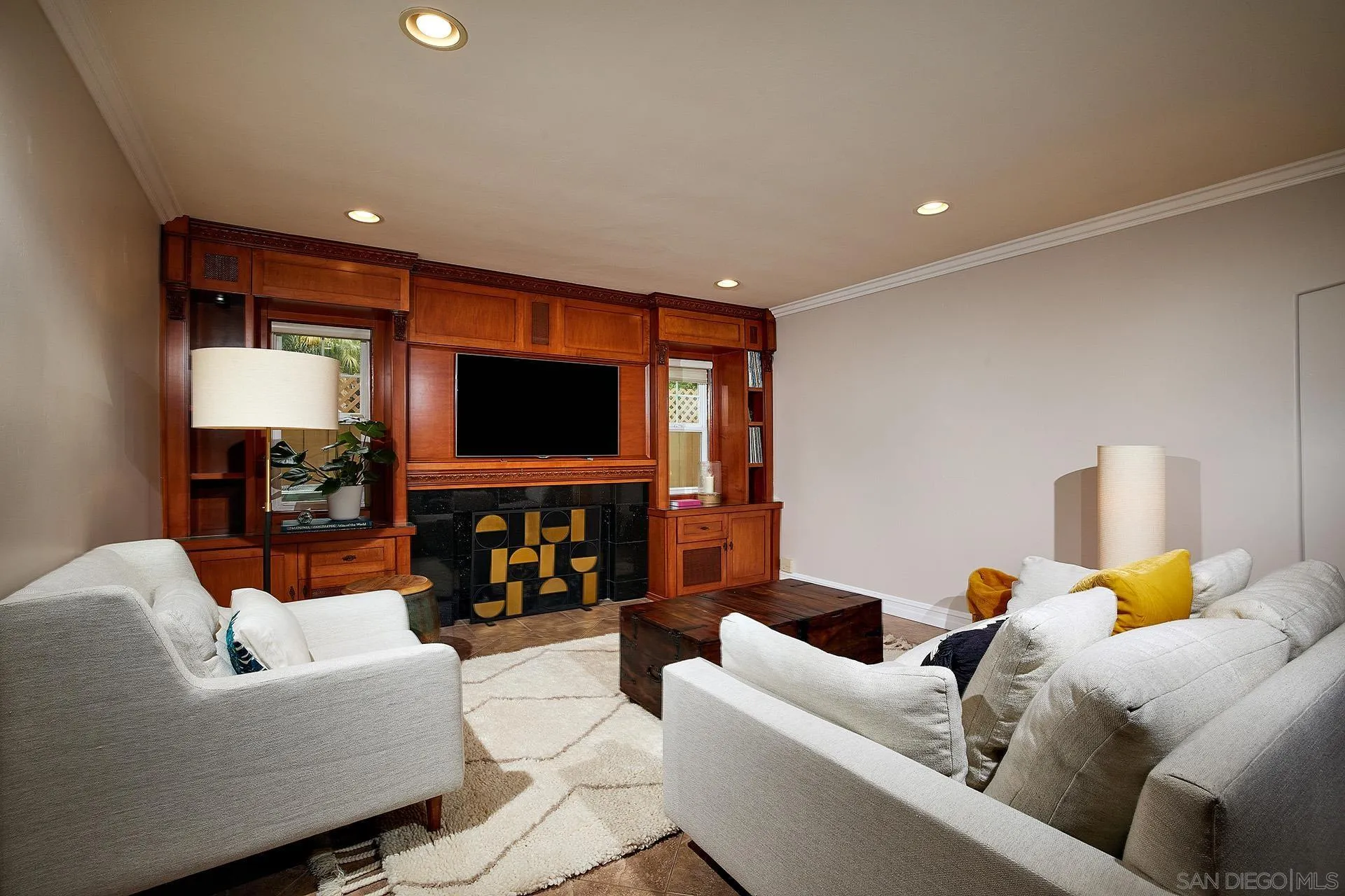 1548 Calle Violetas Encinitas, CA 92024 - Photo 19 of 47 a living room with furniture and a flat screen tv