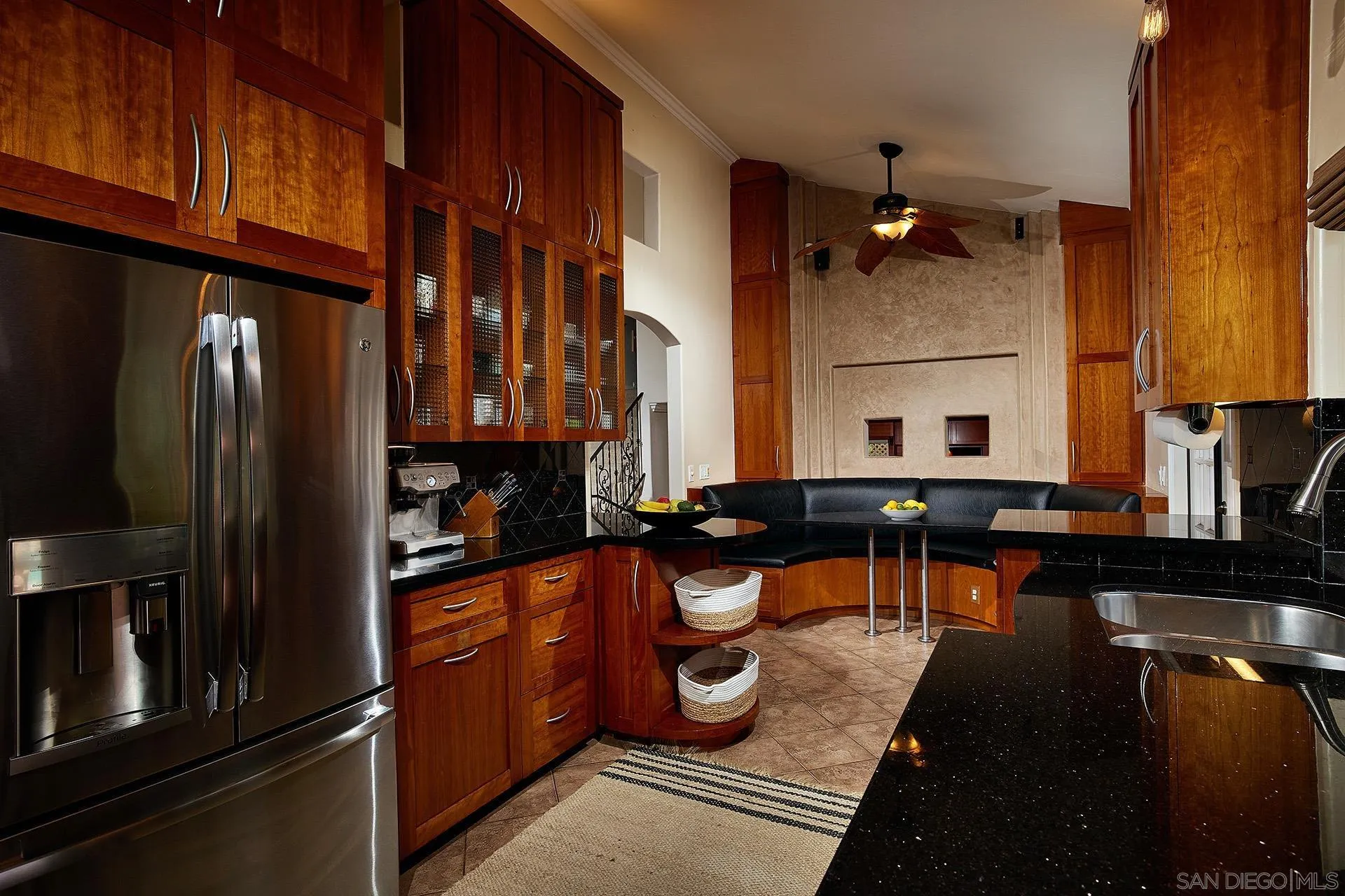 1548 Calle Violetas Encinitas, CA 92024 - Photo 21 of 47 a kitchen with stainless steel appliances granite countertop a refrigerator a stove and a sink