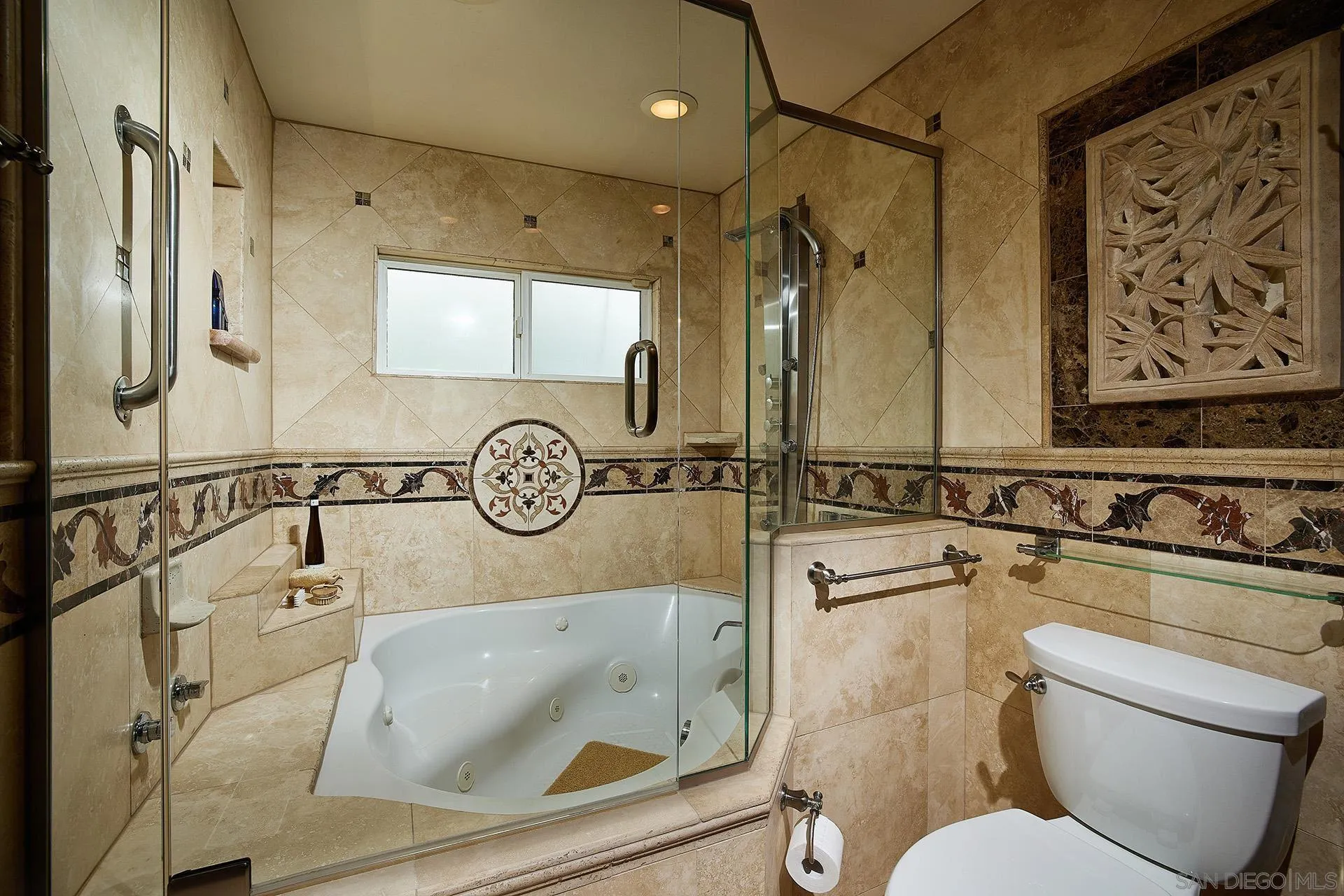 1548 Calle Violetas Encinitas, CA 92024 - Photo 28 of 47 a bathroom with a toilet sink and mirror