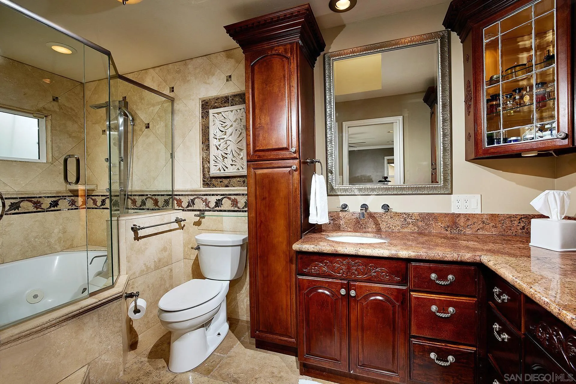 1548 Calle Violetas Encinitas, CA 92024 - Photo 29 of 47 a bathroom with a granite countertop sink toilet and shower
