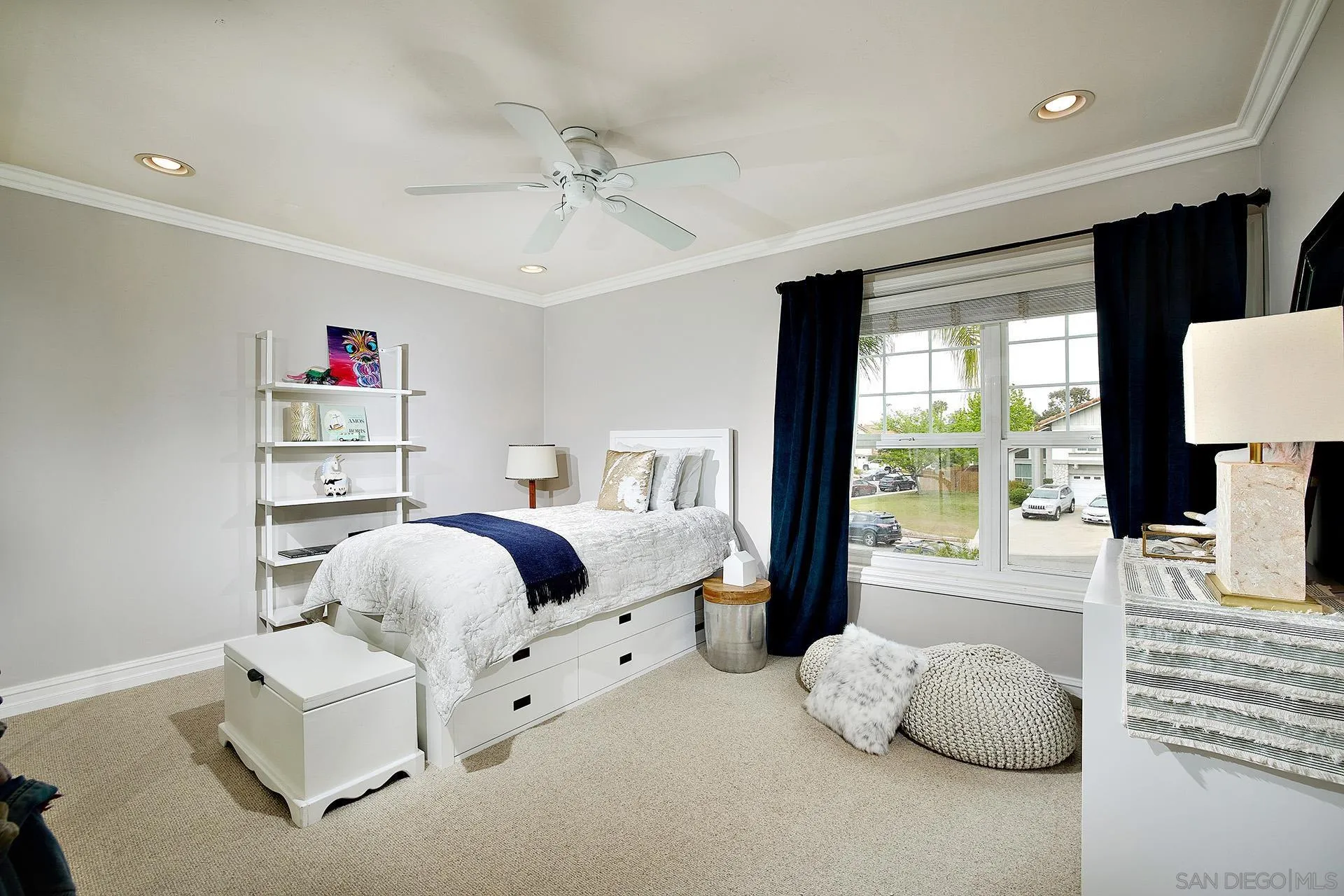 1548 Calle Violetas Encinitas, CA 92024 - Photo 33 of 47 a bedroom with a bed and a large window