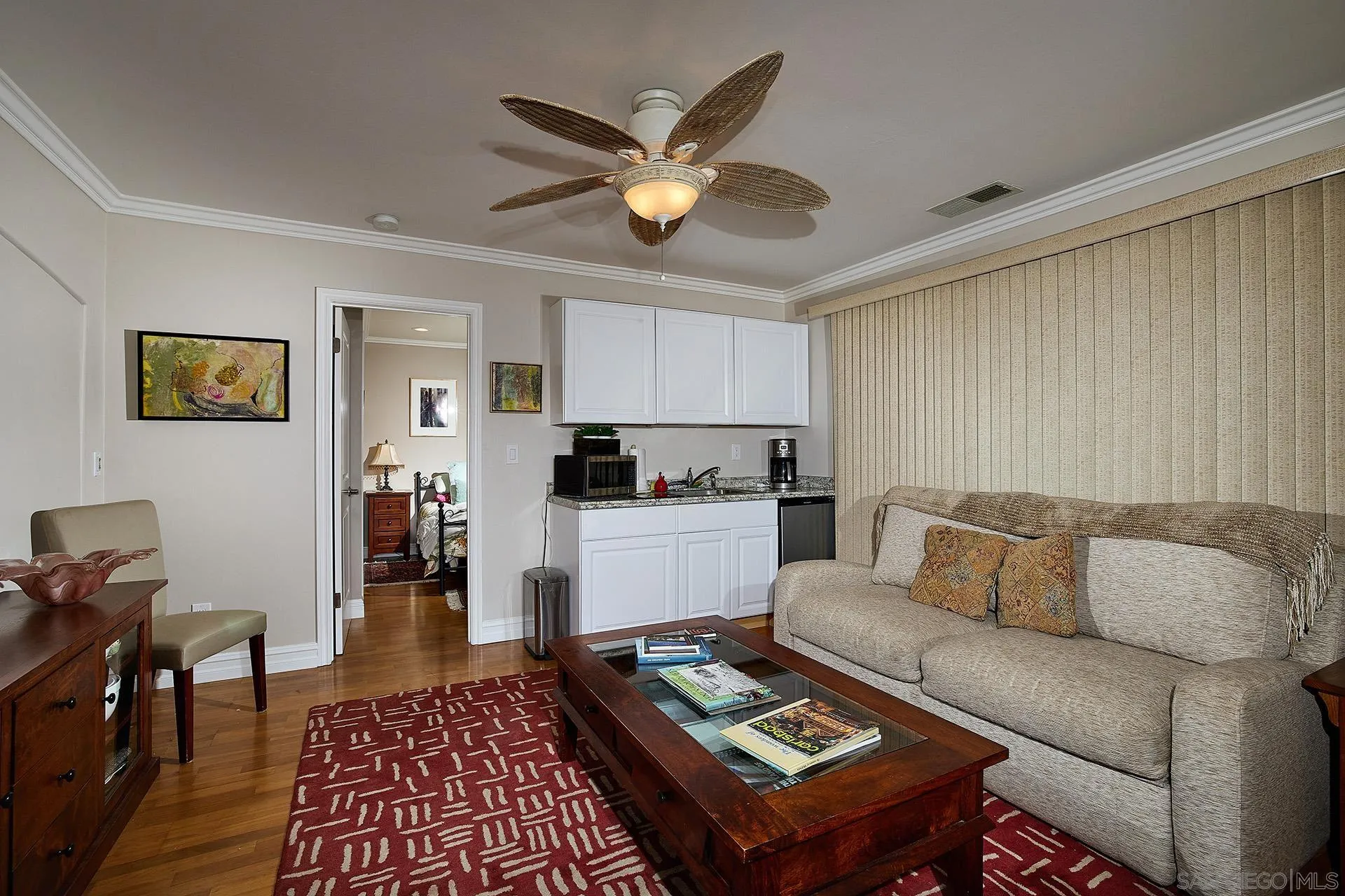 1548 Calle Violetas Encinitas, CA 92024 - Photo 37 of 47 a living room with furniture and a rug