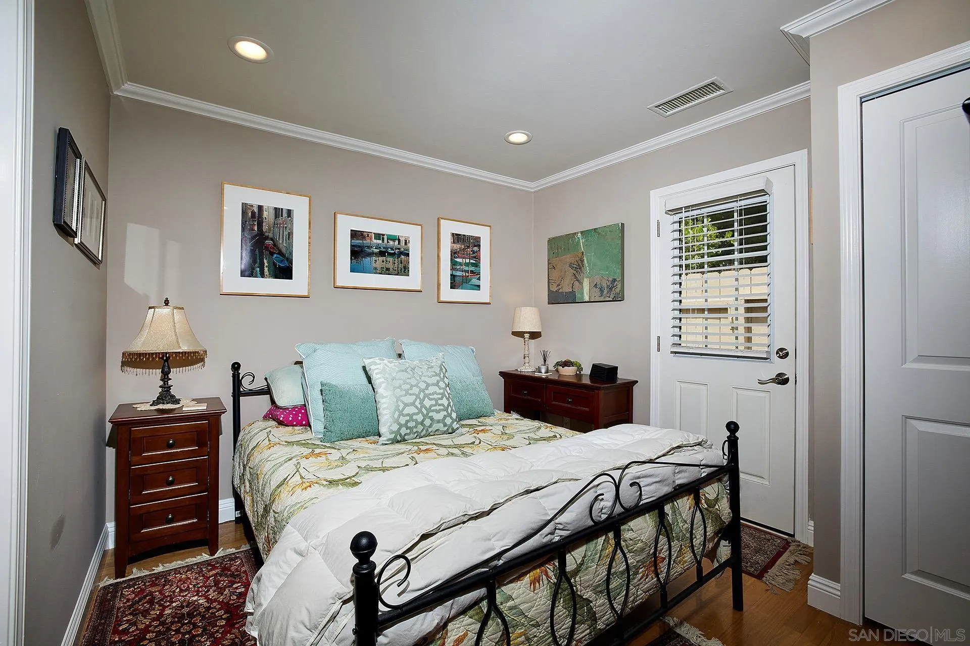 1548 Calle Violetas Encinitas, CA 92024 - Photo 39 of 47 a bedroom with a bed and a dresser