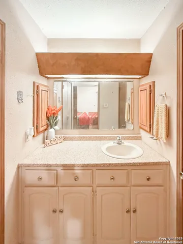 a view of a city with lush green forest