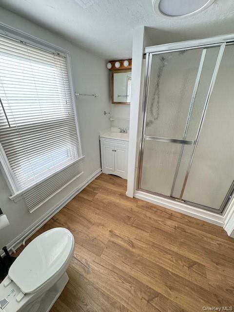 70 Main Street, Unit 2 Cold Spring, NY 10516 - Photo 3 of 9 a bathroom with a sink toilet and shower