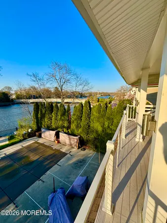 a view of a balcony with ocean view