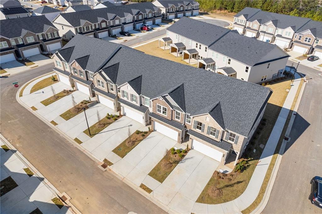 2208 Chant Street Dacula, GA 30019 - Photo 13 of 14 an aerial view of a house with a ocean view
