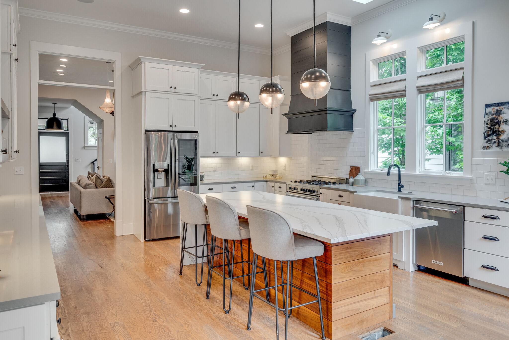 853 B Bradford Avenue Nashville, TN 37204 - Photo 14 of 49 a kitchen with stainless steel appliances granite countertop a sink a stove and a refrigerator