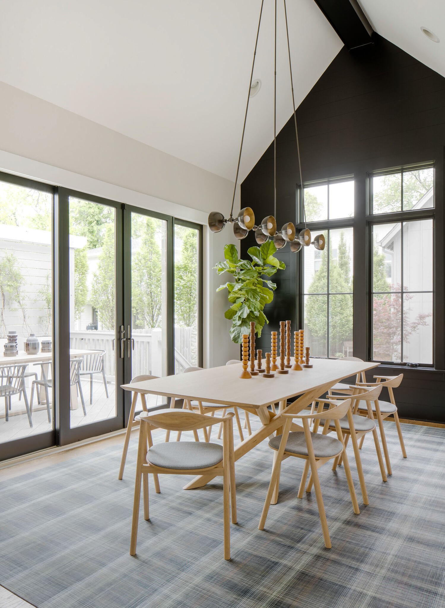 853 B Bradford Avenue Nashville, TN 37204 - Photo 19 of 49 a view of a dining room with furniture window and wooden floor