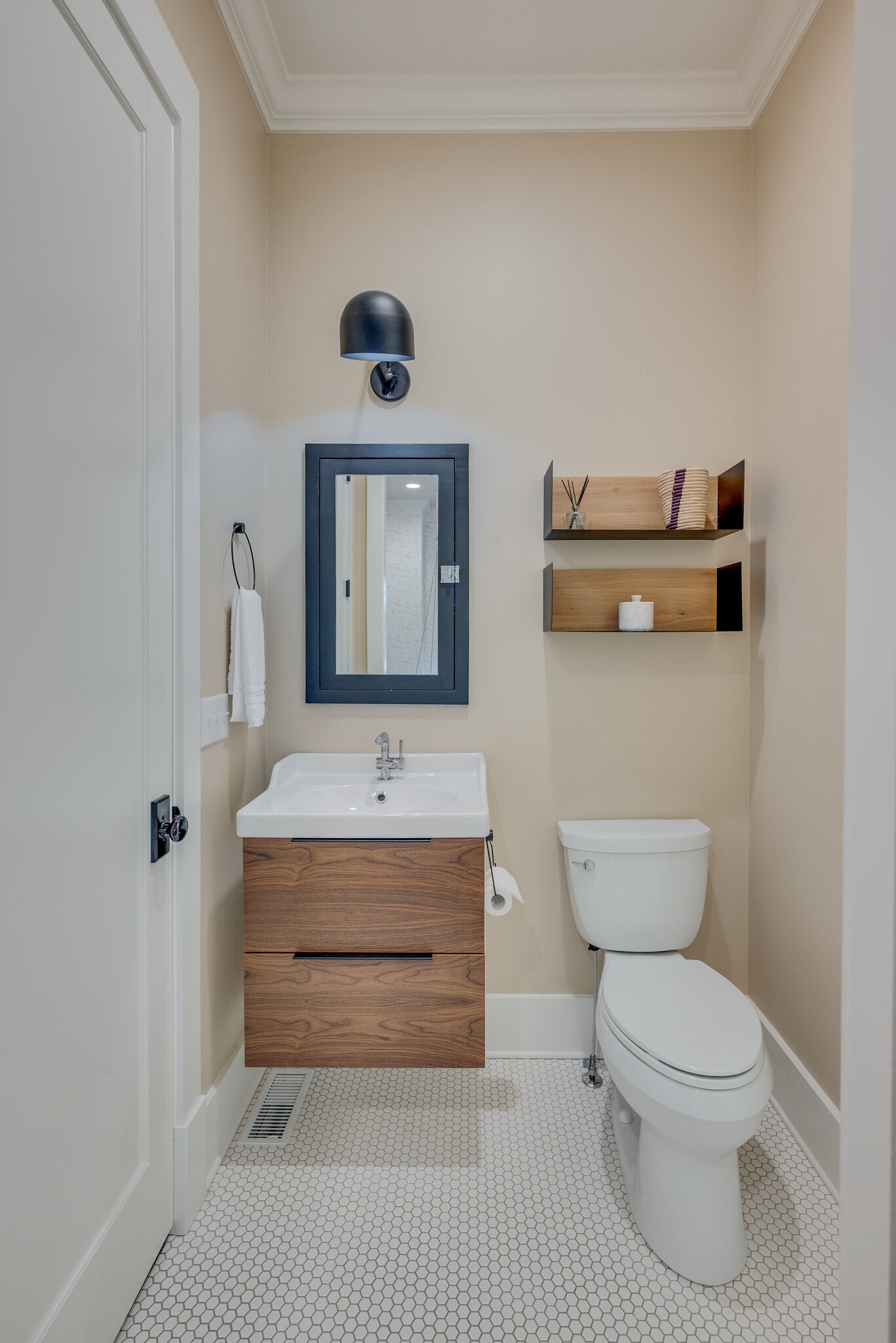 853 B Bradford Avenue Nashville, TN 37204 - Photo 29 of 49 a bathroom with a toilet a sink and mirror
