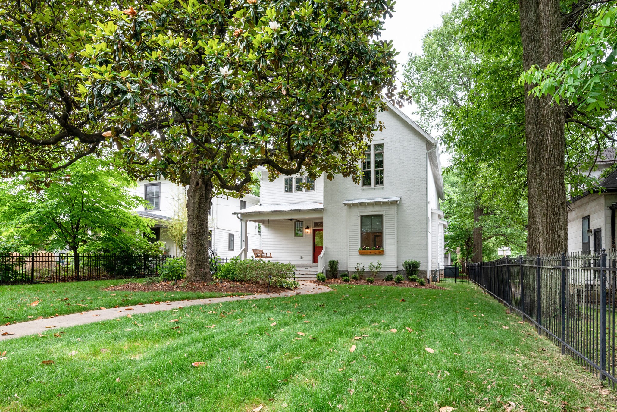 853 B Bradford Avenue Nashville, TN 37204 - Photo 3 of 49 a front view of house with yard and green space