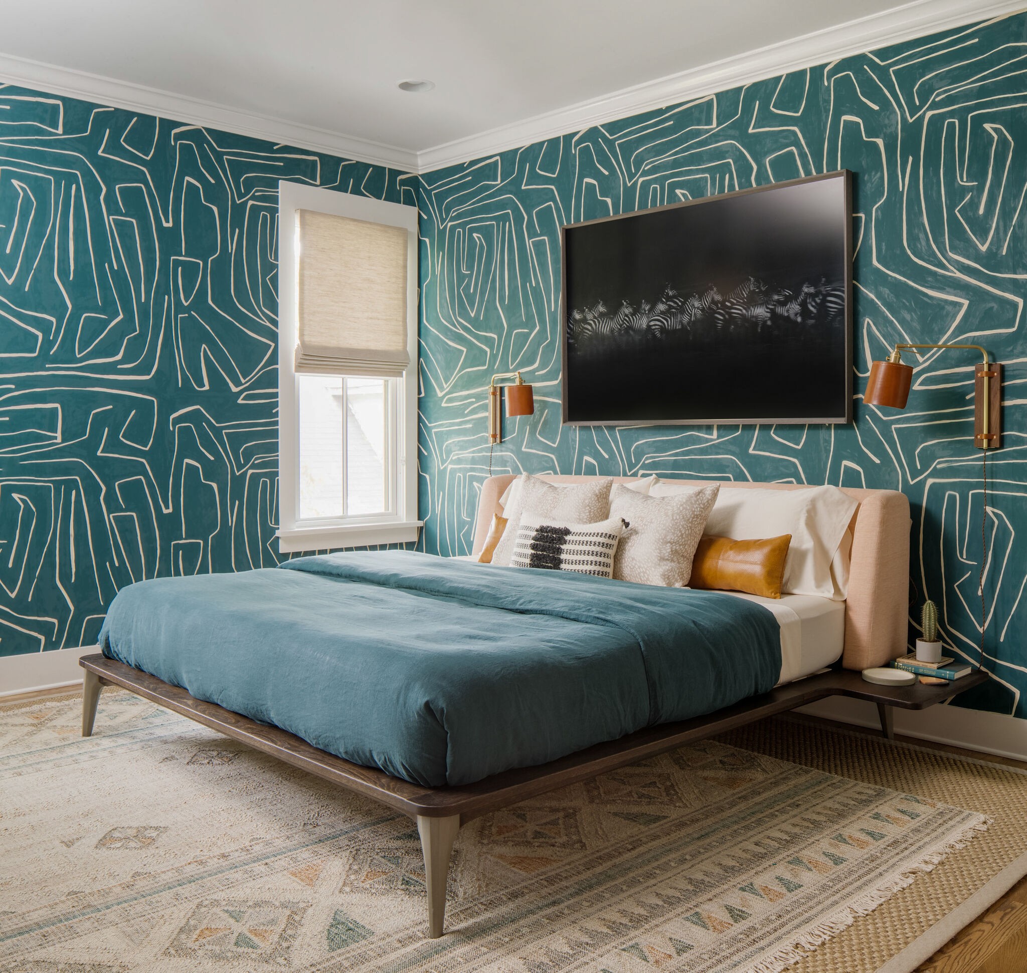 853 B Bradford Avenue Nashville, TN 37204 - Photo 39 of 49 a bedroom with a bed and a painting on the wall