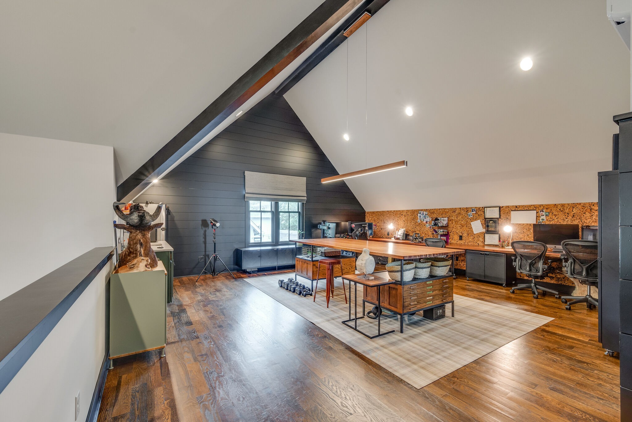 853 B Bradford Avenue Nashville, TN 37204 - Photo 44 of 49 a living room with furniture a wooden floor and next to a window